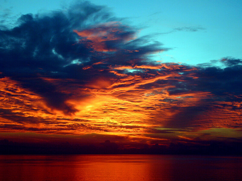 Sunset over Ocean — Orange, Dramatic, Photograph, Clouds, Sky, Water, Blue