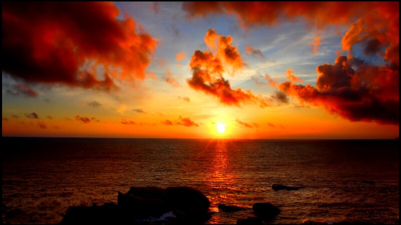 Sunset over Ocean — Orange, Dramatic, Photograph, Clouds, Sun, Rocks