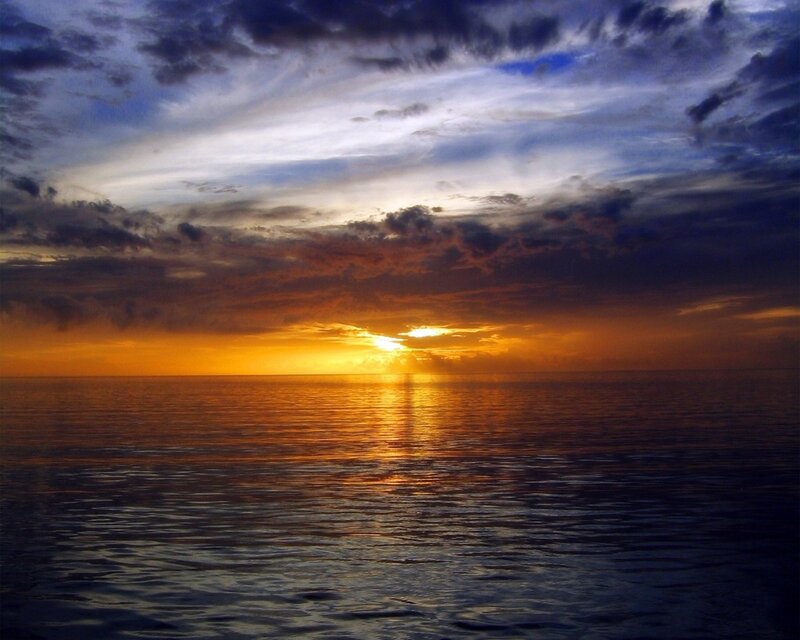 Sunset over Ocean — Orange, Dramatic, Photograph, Clouds, Sun, Water, Blue