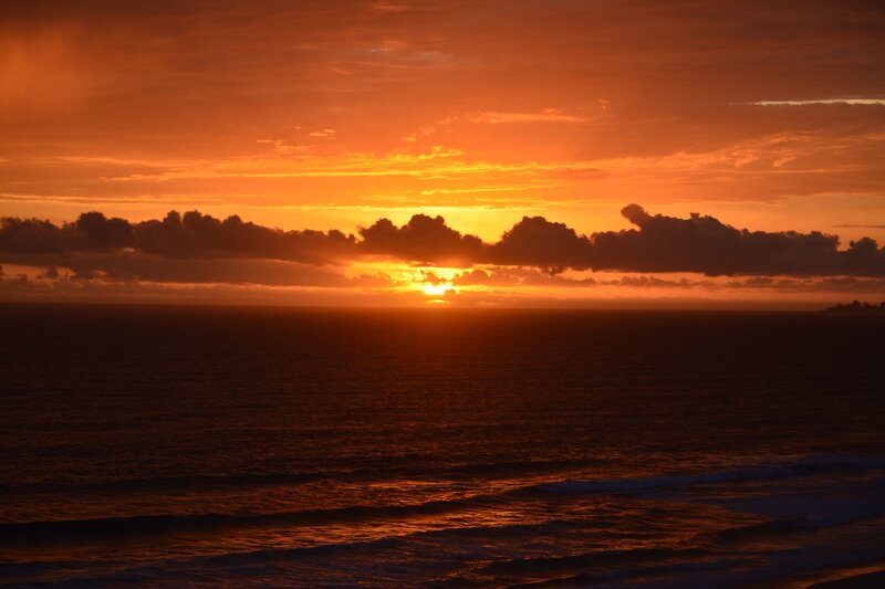 Sunset over Ocean — Orange, Dramatic, Photograph, Clouds, Sun, Waves