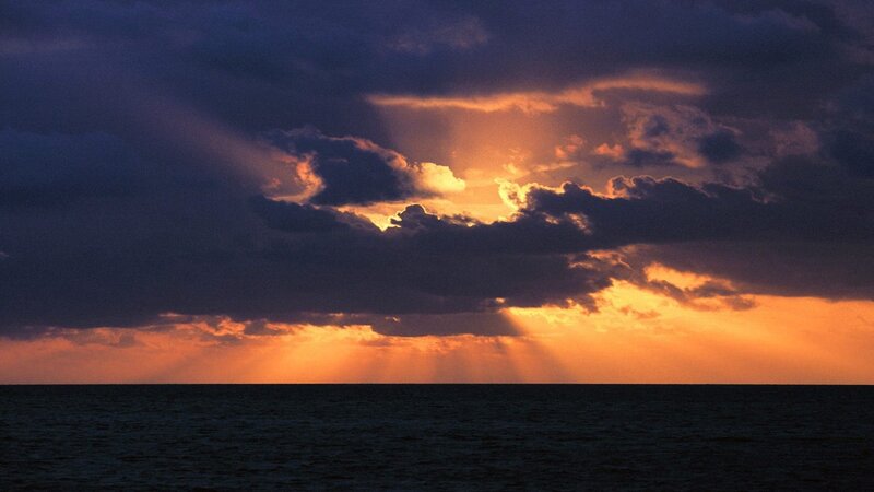 Sunset over Ocean — Orange, Dramatic, Photograph, Clouds, Sunlight, Sea, Purple