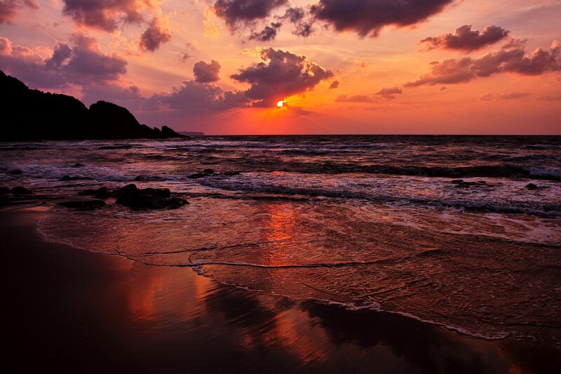 Sunset over Ocean — Orange, Dramatic, Photograph, Clouds, Waves, Sand, Purple