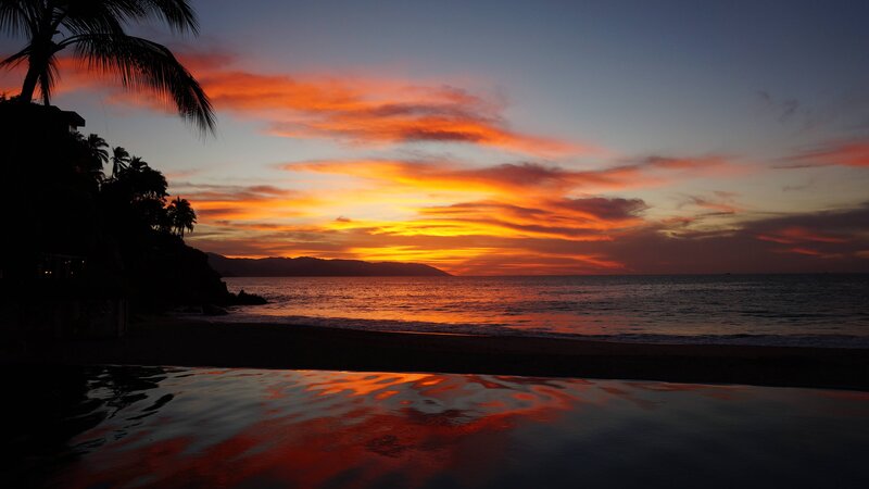 Sunset over Ocean — Orange, Dramatic, Photograph, Palm Tree, Mountain