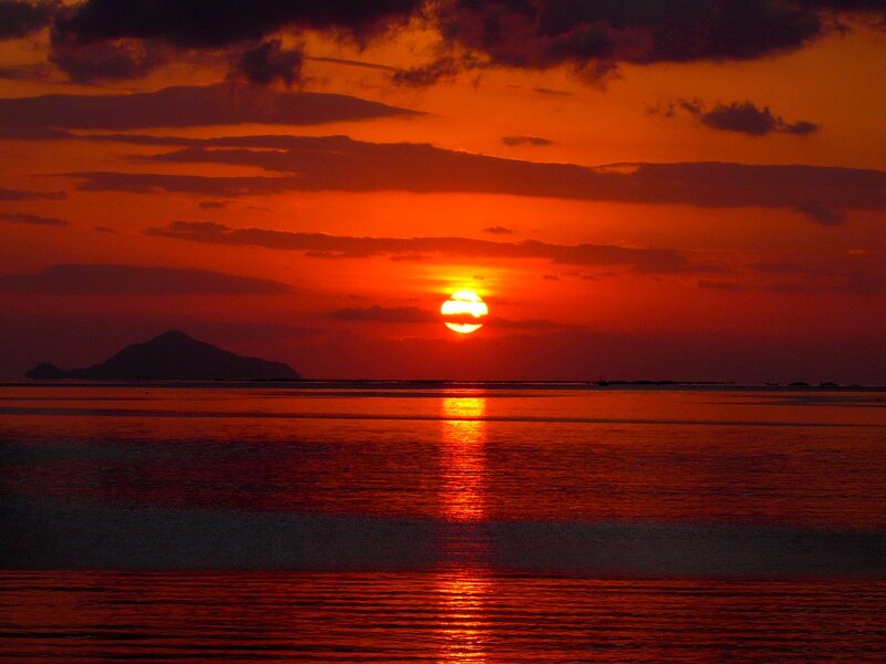 Sunset over Ocean — Orange, Dramatic, Photograph, Sun, Clouds, Island