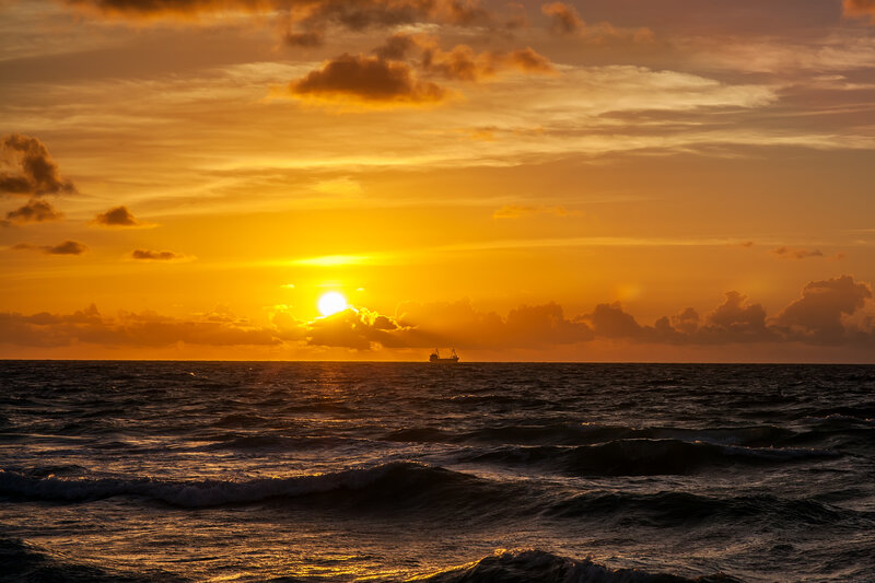 Sunset over Ocean — Orange, Dramatic, Photograph, Sun, Clouds, Ship