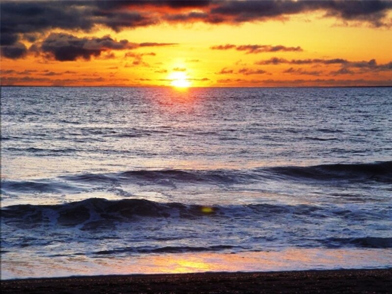 Sunset over Ocean — Orange, Dramatic, Photograph, Sun, Clouds, Waves, Beach