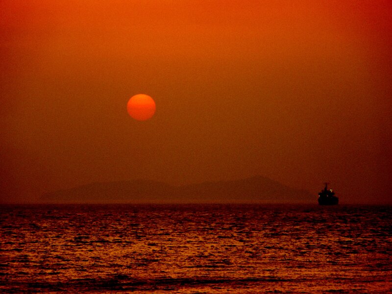 Sunset over Ocean — Orange, Dramatic, Photograph, Sun, Ship, Mountain