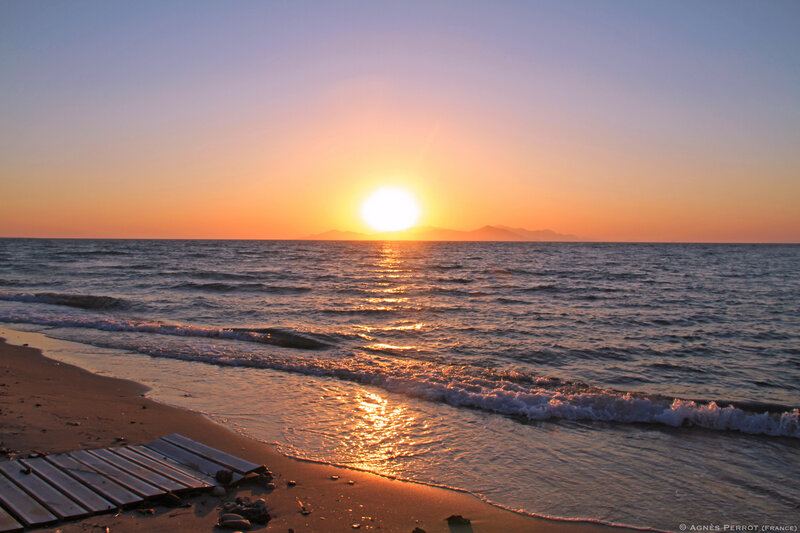 Sunset over Ocean — Orange, Serene, Photograph, Beach, Waves, Mountains