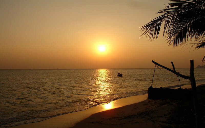 Sunset over Ocean — Orange, Serene, Photograph, Boat, Palm Tree, Beach