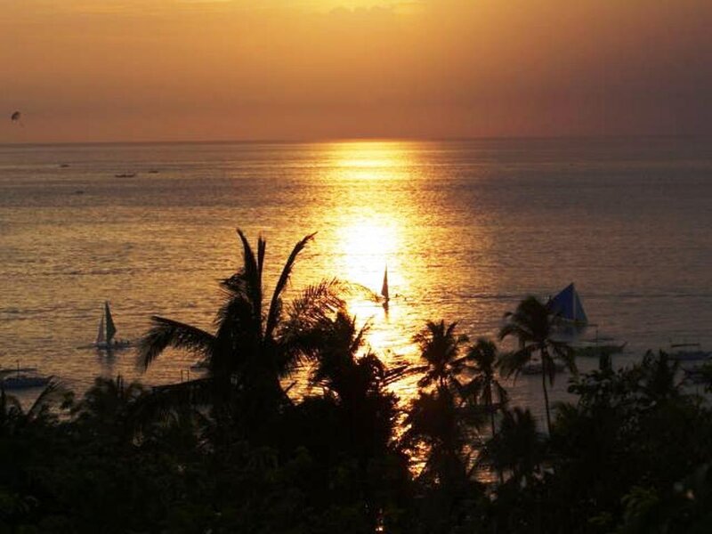 Sunset over Ocean — Orange, Serene, Photograph, Boats