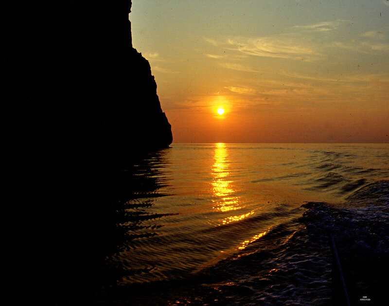 Sunset over Ocean — Orange, Serene, Photograph, Cliff