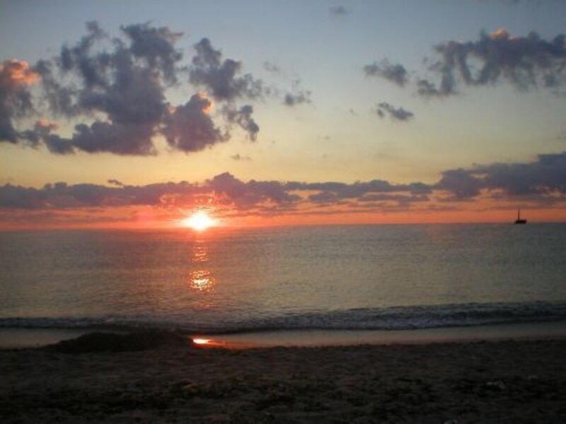 Sunset over Ocean — Orange, Serene, Photograph, Clouds, Boat