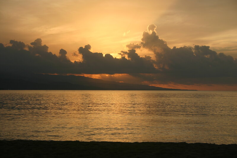 Sunset over Ocean — Orange, Serene, Photograph, Clouds, Mountains, Beach