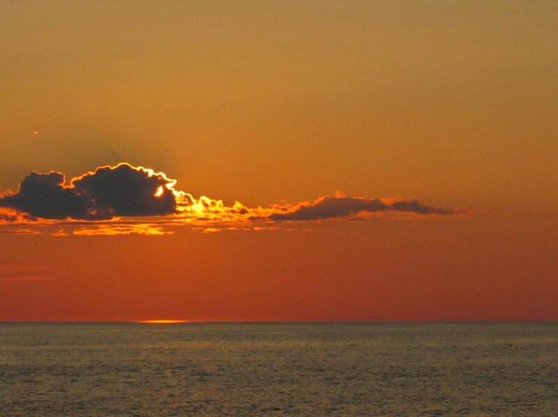 Sunset over Ocean — Orange, Serene, Photograph, Clouds, Sun, Sea, Yellow