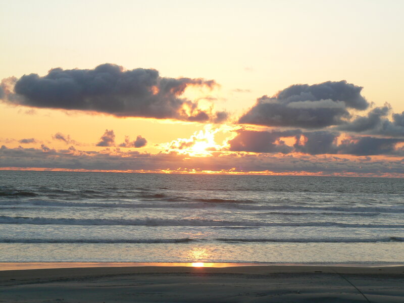 Sunset over Ocean — Orange, Serene, Photograph, Clouds, Waves, Sand
