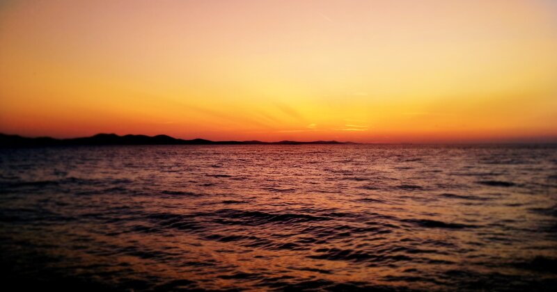 Sunset over Ocean — Orange, Serene, Photograph, Horizon