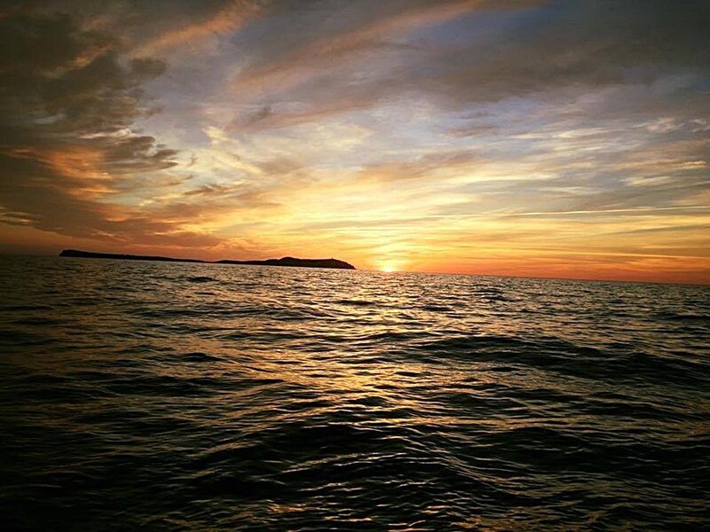 Sunset over Ocean — Orange, Serene, Photograph, Island, Clouds