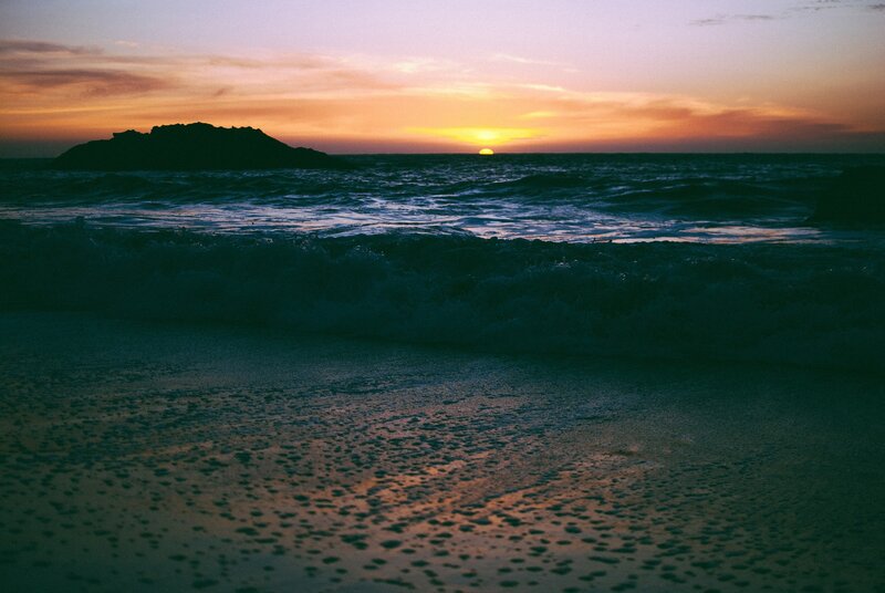 Sunset over Ocean — Orange, Serene, Photograph, Island, Waves