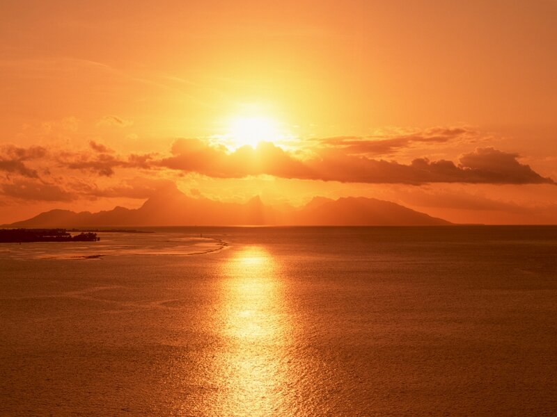 Sunset over Ocean — Orange, Serene, Photograph, Mountains, Clouds, Reflection