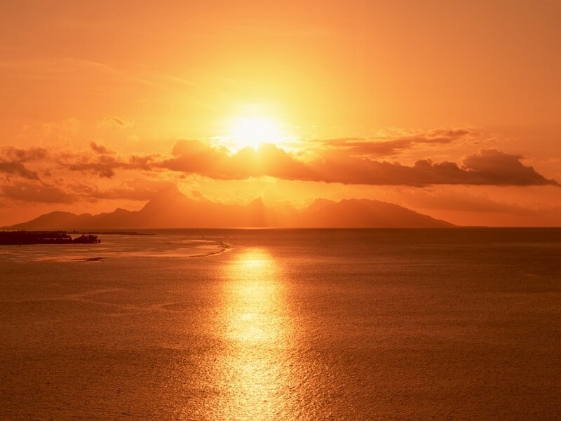 Sunset over Ocean — Orange, Serene, Photograph, Mountains, Clouds