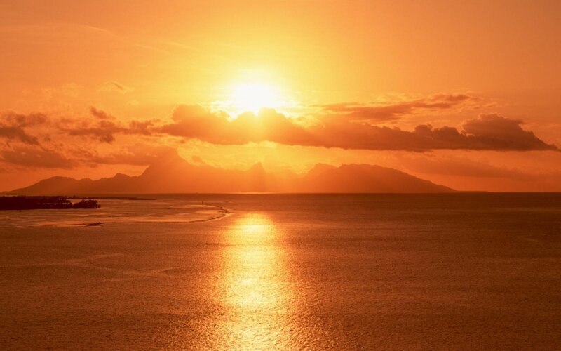 Sunset over Ocean — Orange, Serene, Photograph, Mountains