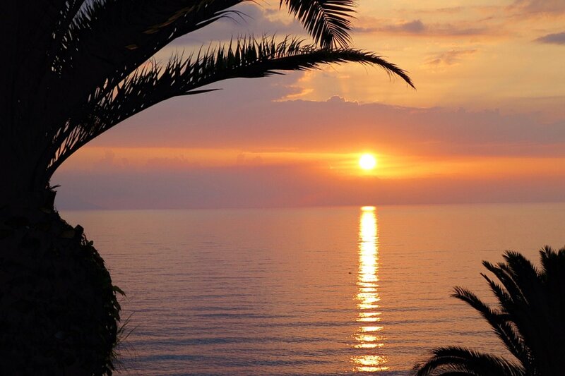 Sunset over Ocean — Orange, Serene, Photograph, Palm Tree, Sun