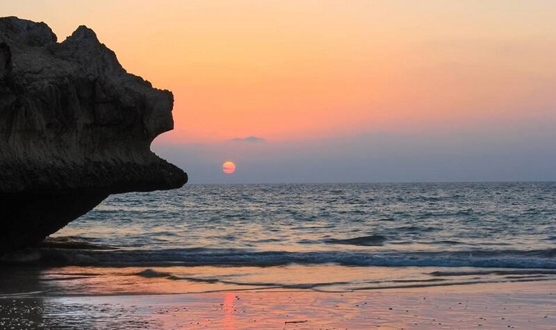 Sunset over Ocean — Orange, Serene, Photograph, Rock, Sea