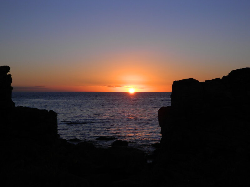 Sunset over Ocean — Orange, Serene, Photograph, Rocks, Sky