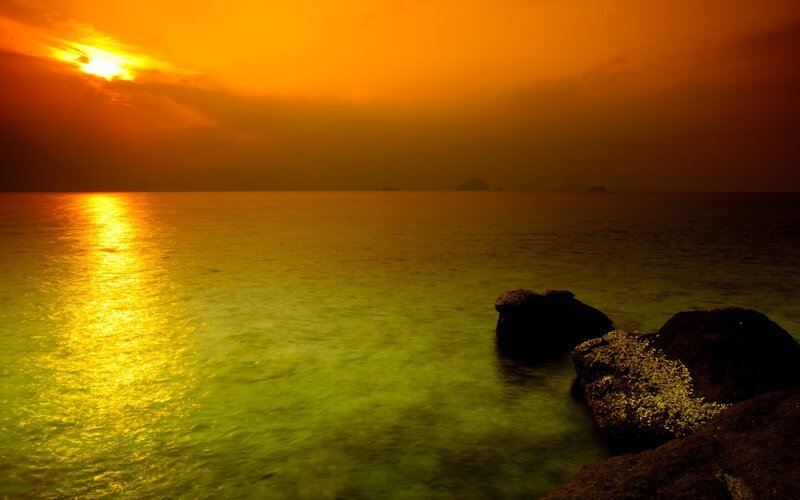 Sunset over Ocean — Orange, Serene, Photograph, Rocks, Sun