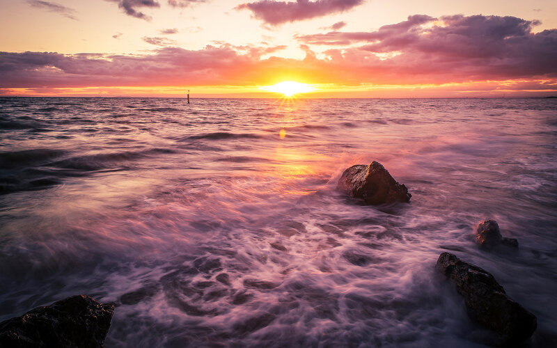 Sunset over Ocean — Orange, Serene, Photograph, Rocks, Waves, Sun