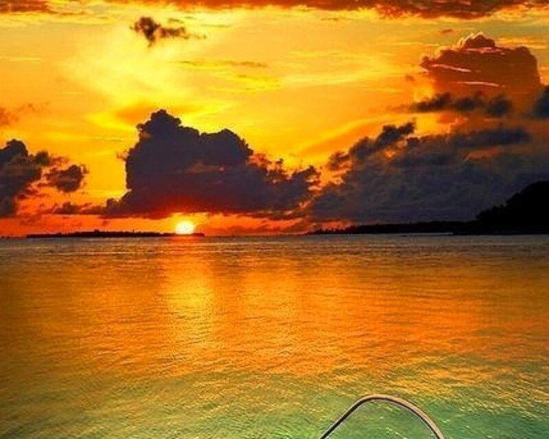 Sunset over Ocean — Orange, Serene, Photograph, Sun, Clouds, Boat