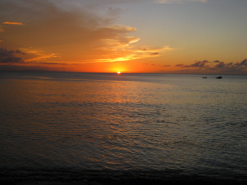 Sunset over Ocean — Orange, Serene, Photograph, Sun, Clouds, Boats