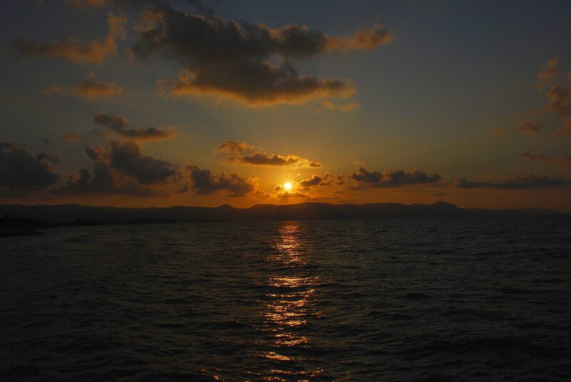 Sunset over Ocean — Orange, Serene, Photograph, Sun, Clouds, Mountains