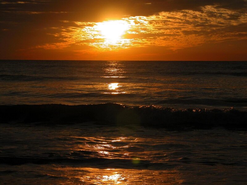 Sunset over Ocean — Orange, Serene, Photograph, Sun, Clouds, Waves, Yellow
