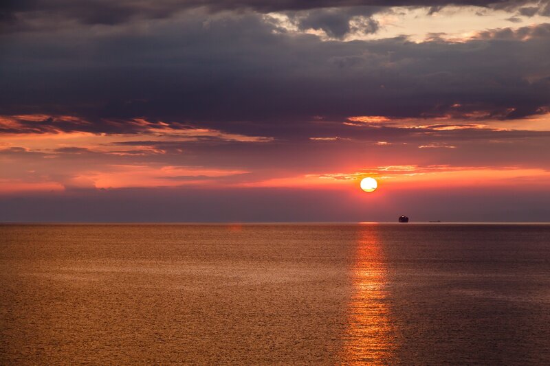 Sunset over Ocean — Orange, Serene, Photograph, Sun, Ship