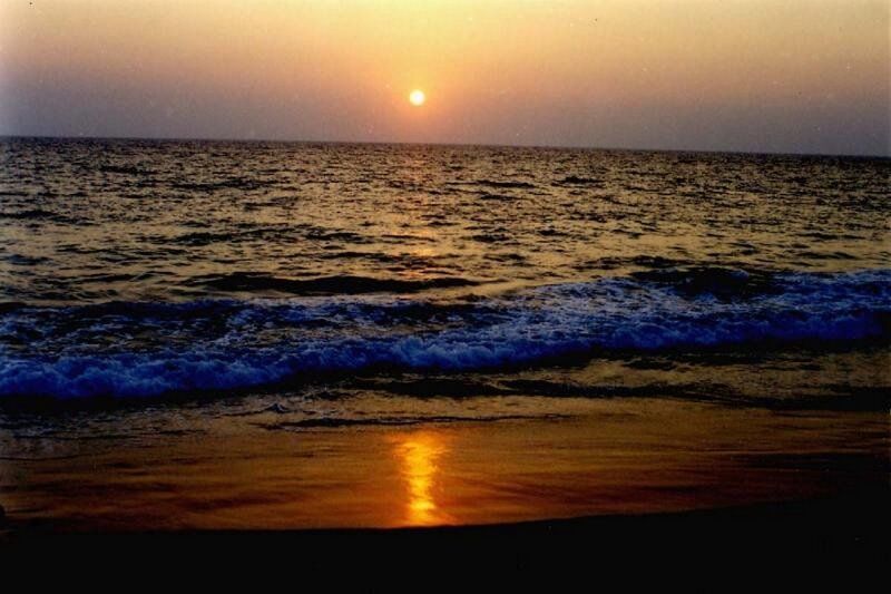 Sunset over Ocean — Orange, Serene, Photograph, Sun, Waves, Beach, Blue, Black