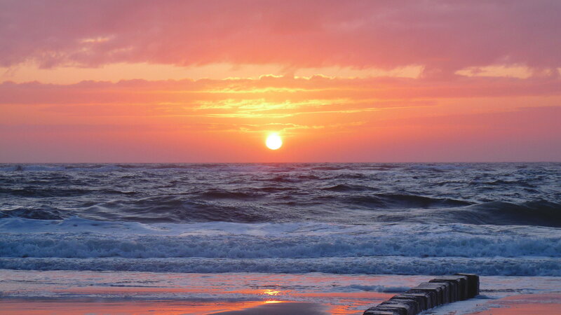 Sunset over Ocean — Orange, Serene, Photograph, Sun, Waves, Beach, Breakwater