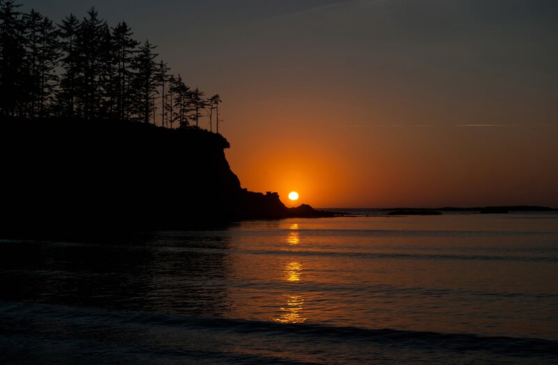 Sunset over Ocean — Orange, Serene, Photograph, Trees, Cliff