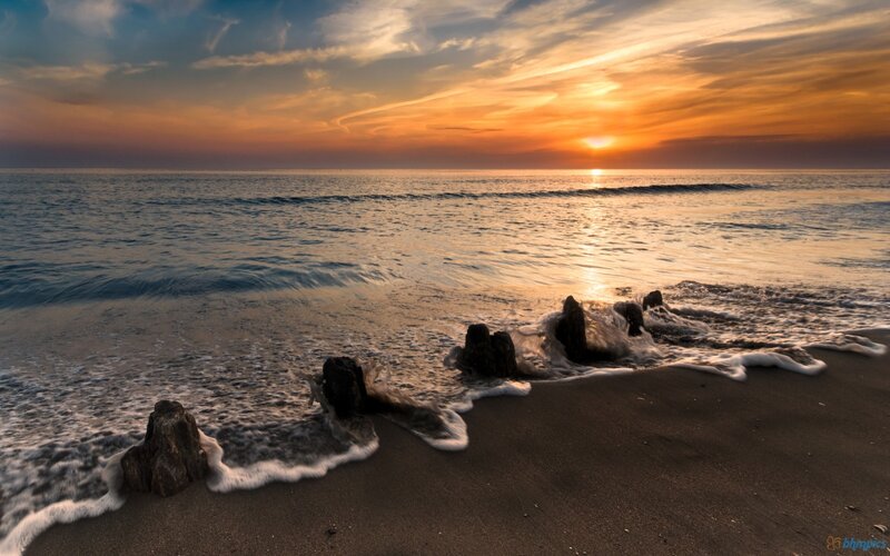 Sunset over Ocean — Orange, Serene, Photograph, Waves, Sand