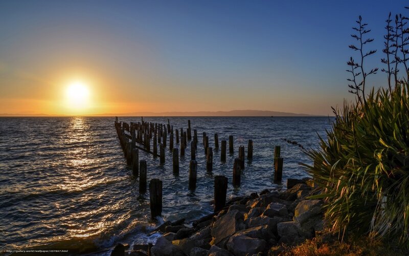 Sunset over Ocean Pier — Blue, Serene, Photograph, Rocks