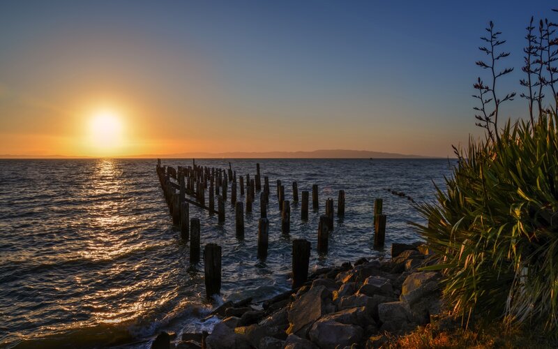 Sunset over Ocean Pier — Blue, Serene, Photograph