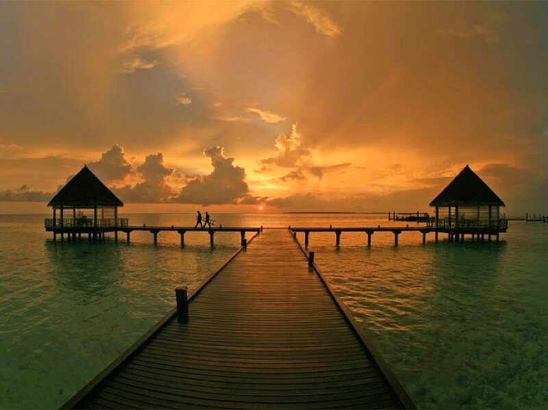 Sunset over ocean pier
