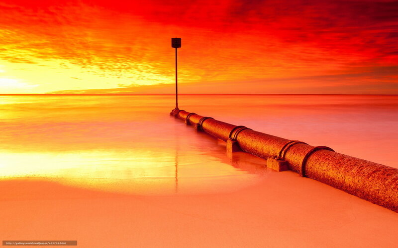 Sunset over ocean pipe