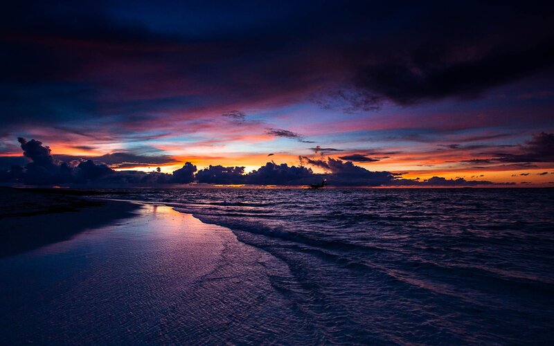 Sunset over Ocean — Purple, Dramatic, Photograph, Clouds, Beach, Boat