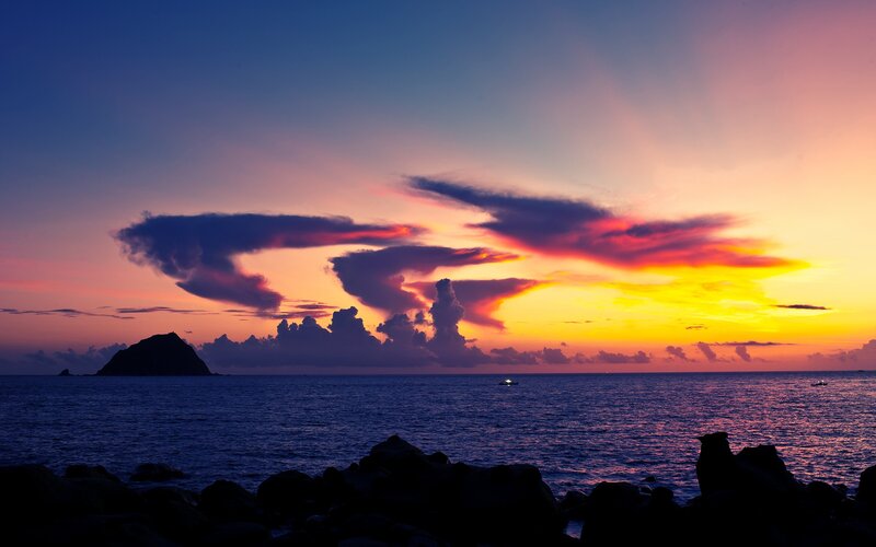 Sunset over Ocean — Purple, Dramatic, Photograph, Clouds, Island, Boat