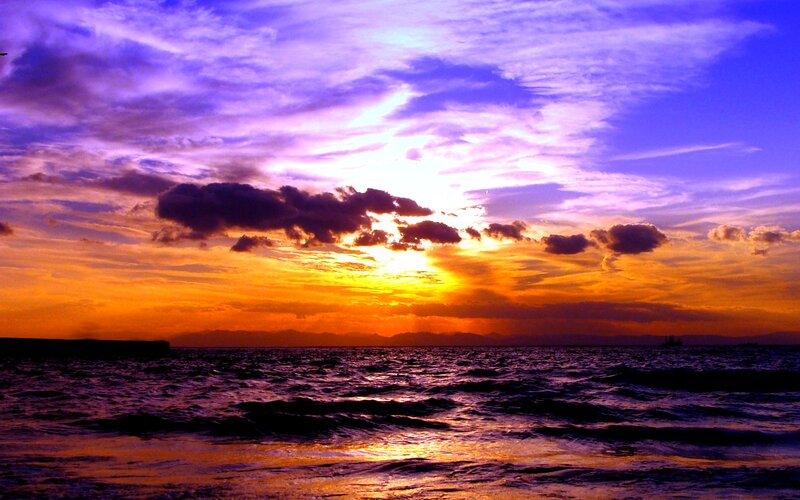 Sunset over Ocean — Purple, Dramatic, Photograph, Clouds, Mountains