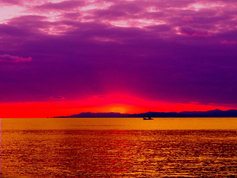 Sunset over Ocean — Red, Dramatic, Photograph, Boat, Mountains