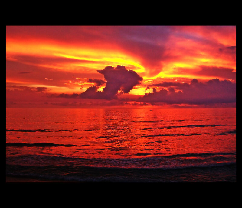 Sunset over Ocean — Red, Dramatic, Photograph, Clouds, Boat