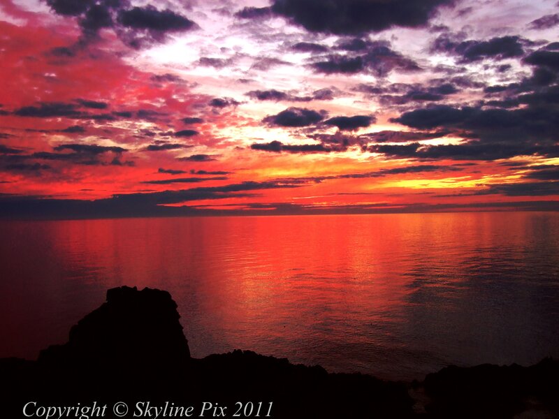 Sunset over Ocean — Red, Dramatic, Photograph, Clouds, Rocks, Sea