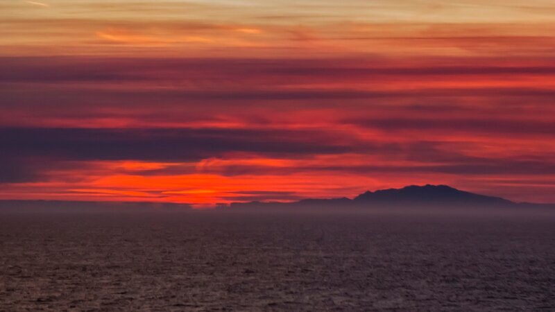 Sunset over Ocean — Red, Dramatic, Photograph, Mountain, Sky